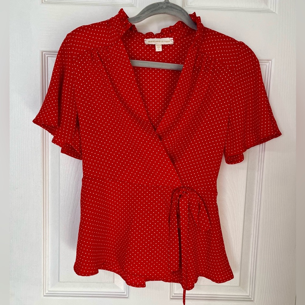 Red and white polka dot blouse